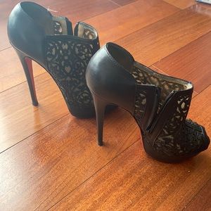 Black booties, “lace cut”